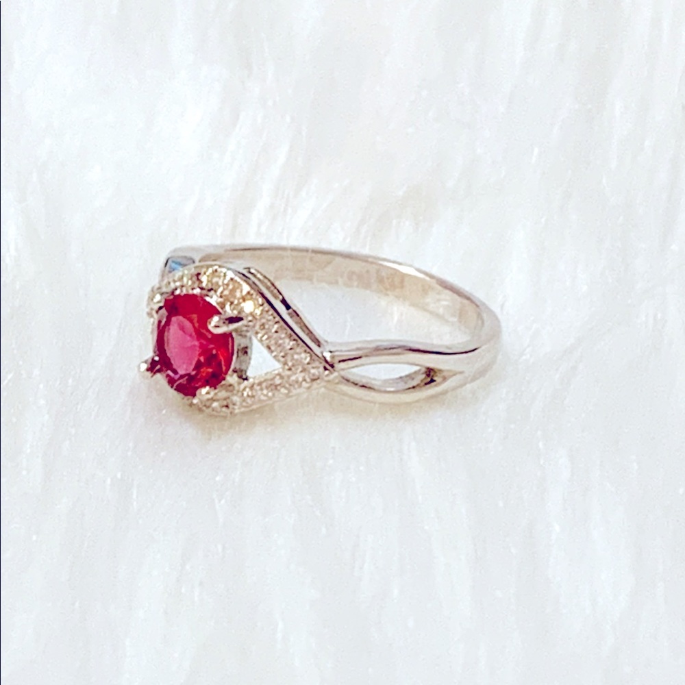Infinity Simulated Ruby And Cubic Zirconia Ring - image 1
